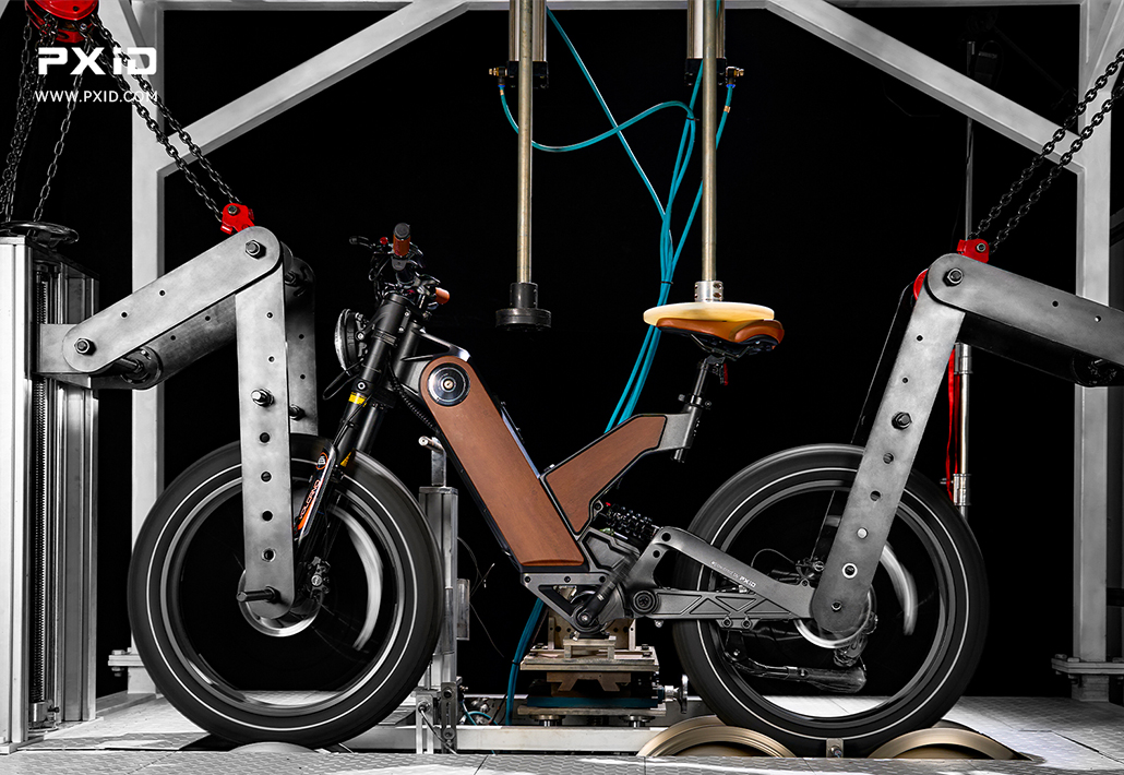 PXID 250W mid-drive e-bike climb test in an engineering laboratory