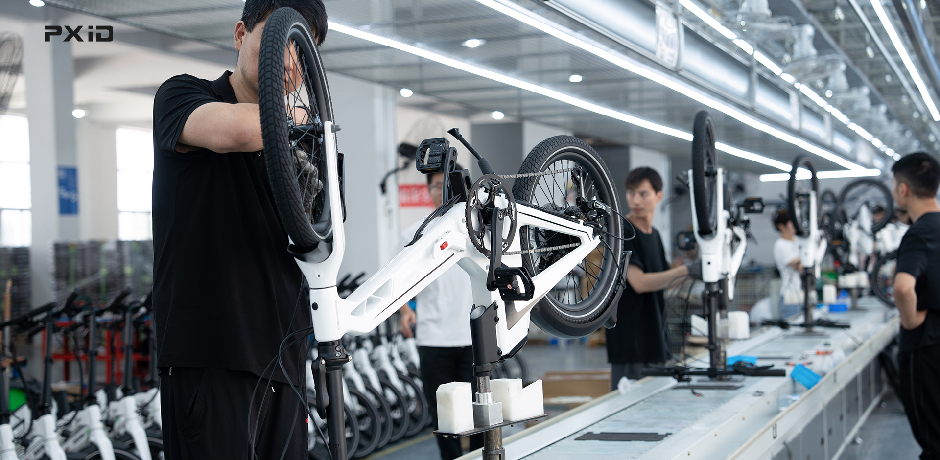 Production line assembling electric bicycles and electric scooters demonstrating China manufacturing efficiency and OEM capabilities