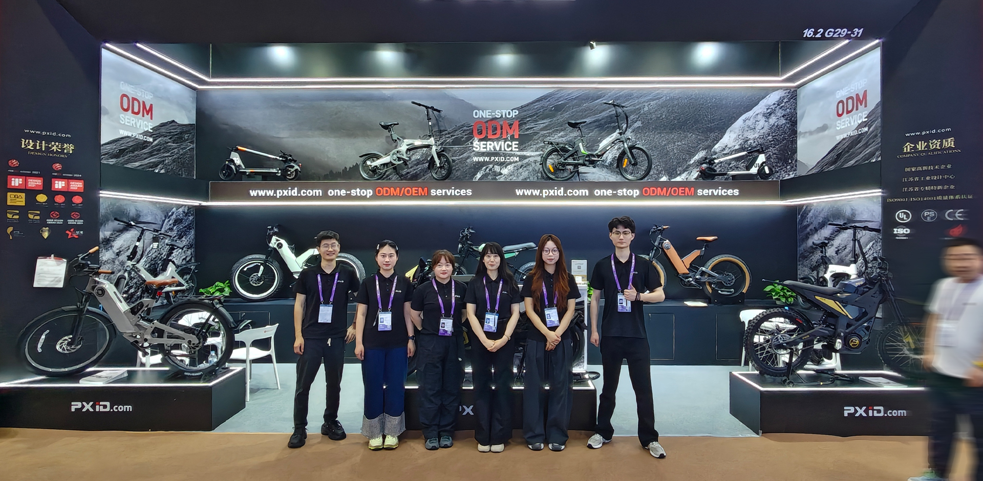 Interior of Canton Fair Hall 13 with international buyers exploring electric mobility products and OEM manufacturers 