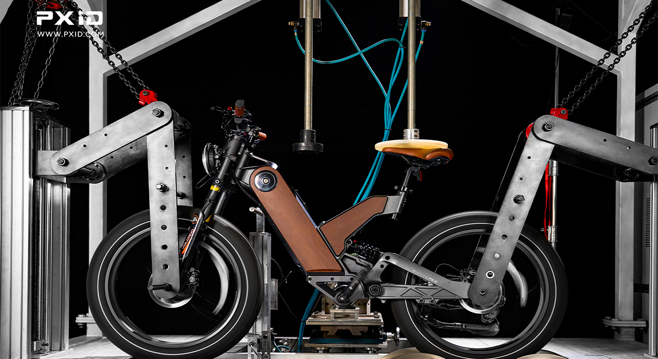 PXID 250W mid-drive e-bike climb test in an engineering laboratory